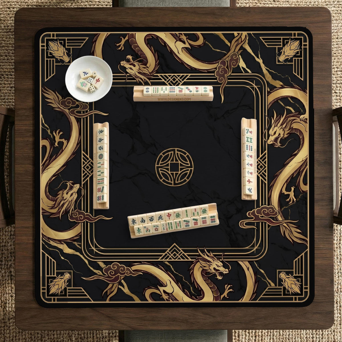 Square black mahjong mat with gold dragon artwork around the border and a light marble texture in the center.