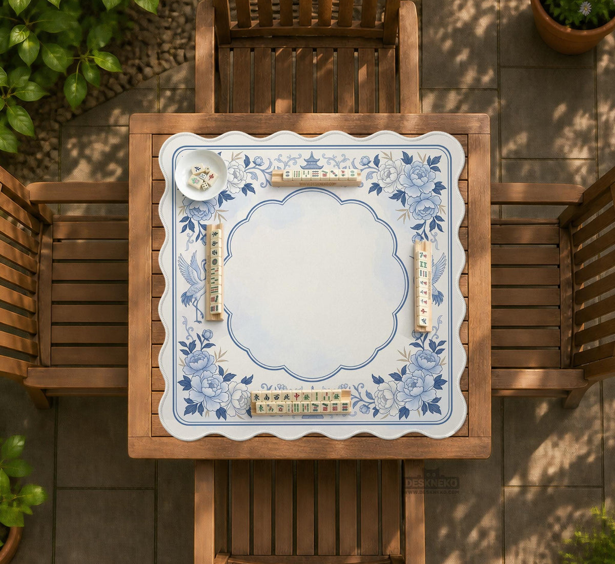 Square mahjong mat with a blue chinoiserie floral pattern on a light background.