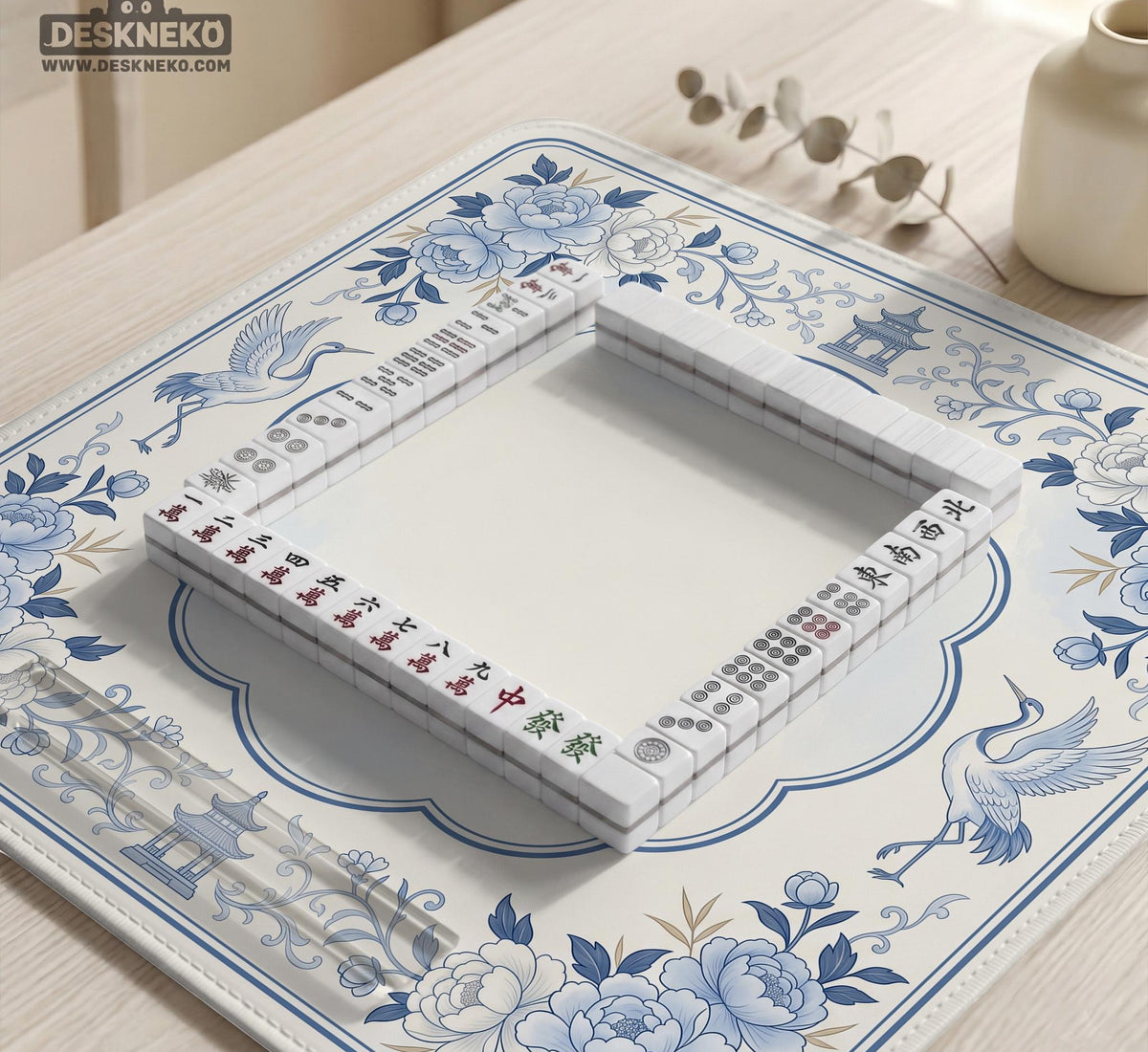 Square mahjong mat with a blue chinoiserie floral pattern on a light background.