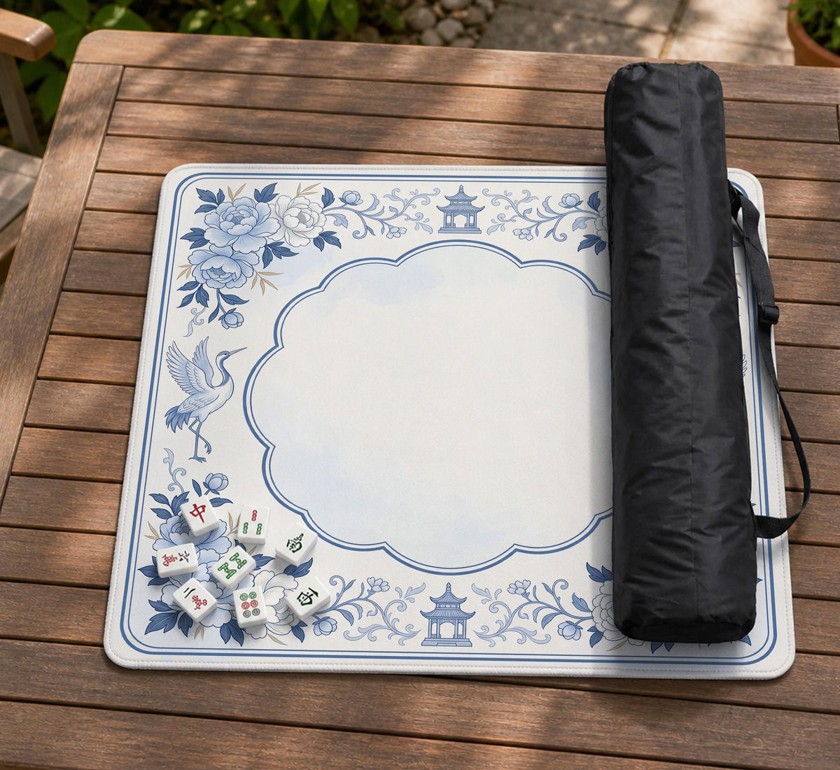 Square mahjong mat with a blue chinoiserie floral pattern on a light background.
