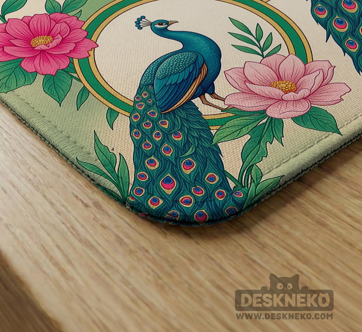 Green mahjong mat with peacocks, hibiscus flowers, tropical leaves, cream center space, and a scalloped floral border.