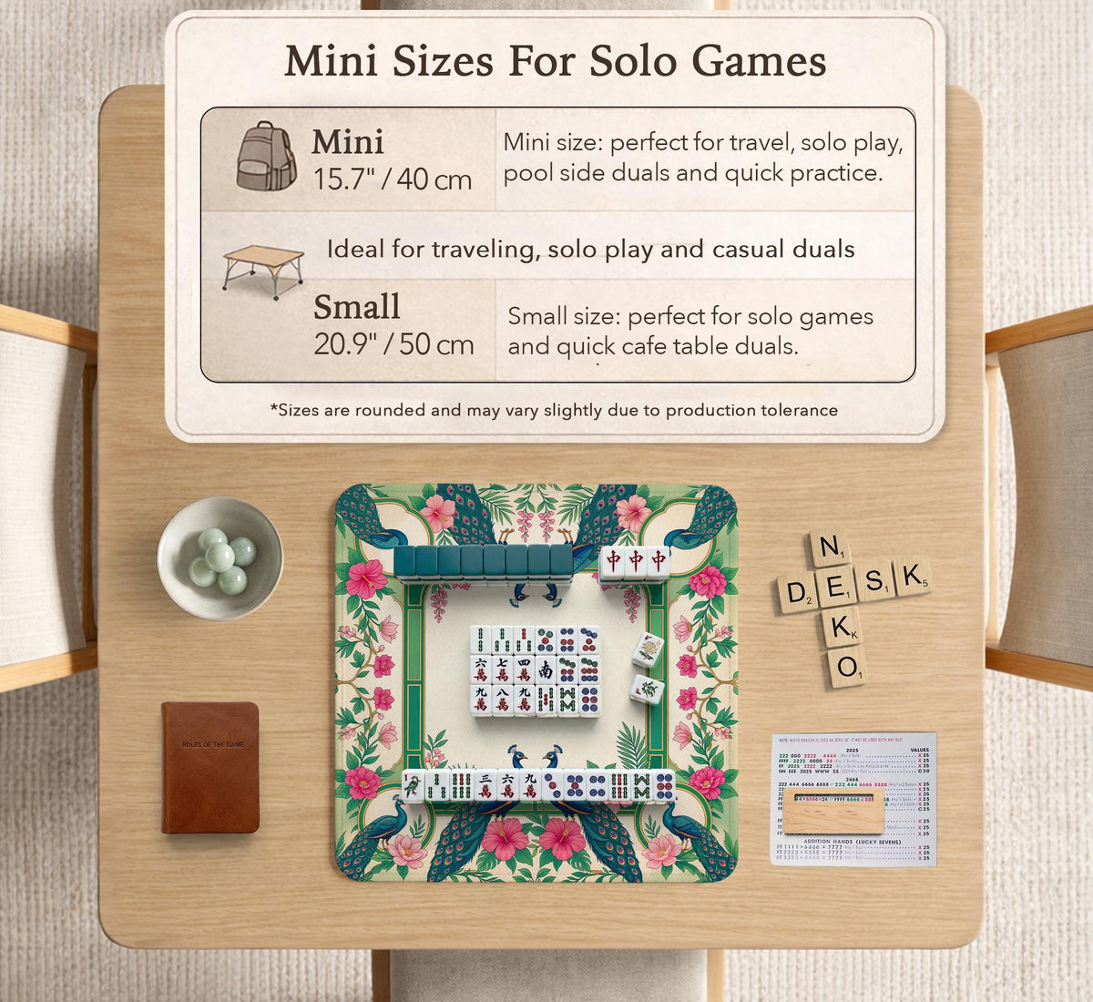 Green mahjong mat with peacocks, hibiscus flowers, tropical leaves, cream center space, and a scalloped floral border.