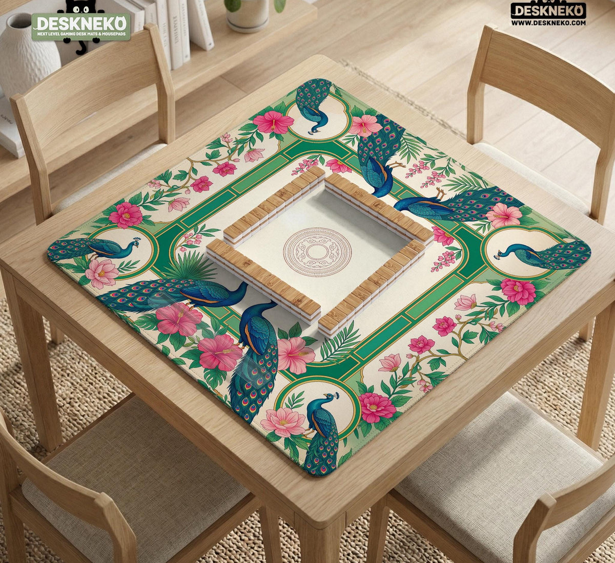 Green mahjong mat with peacocks, hibiscus flowers, tropical leaves, cream center space, and a scalloped floral border.
