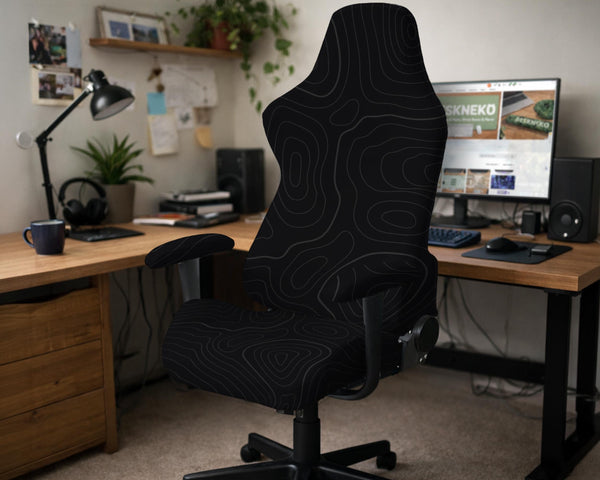 Black chair cover with a thin line art pattern on a gaming chair, shown with a high back and armrest areas covered.