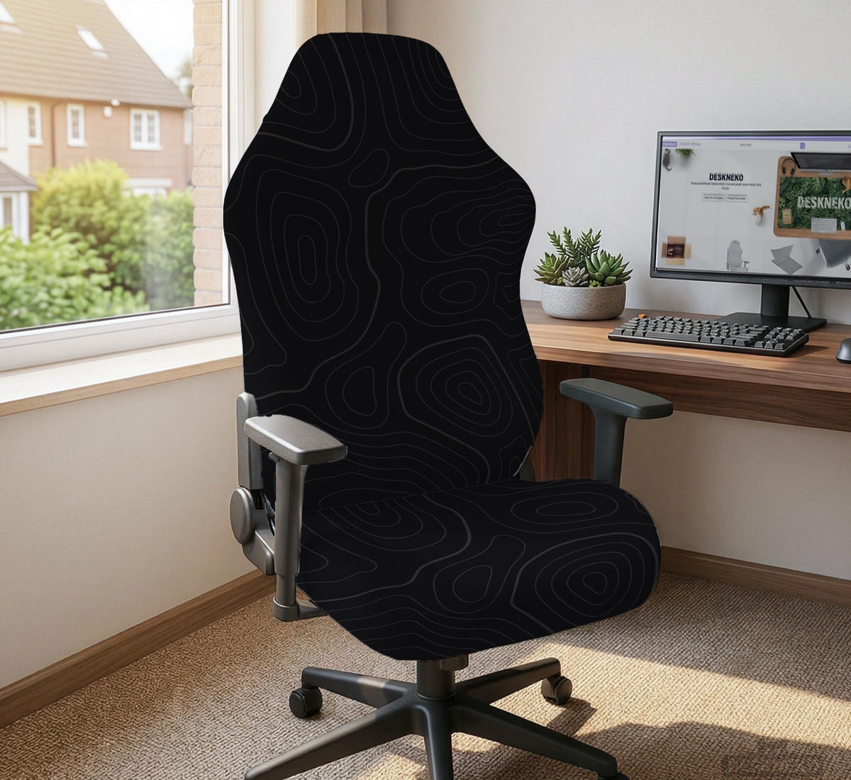 Black chair cover with a thin line art pattern on a gaming chair, shown with a high back and armrest areas covered.