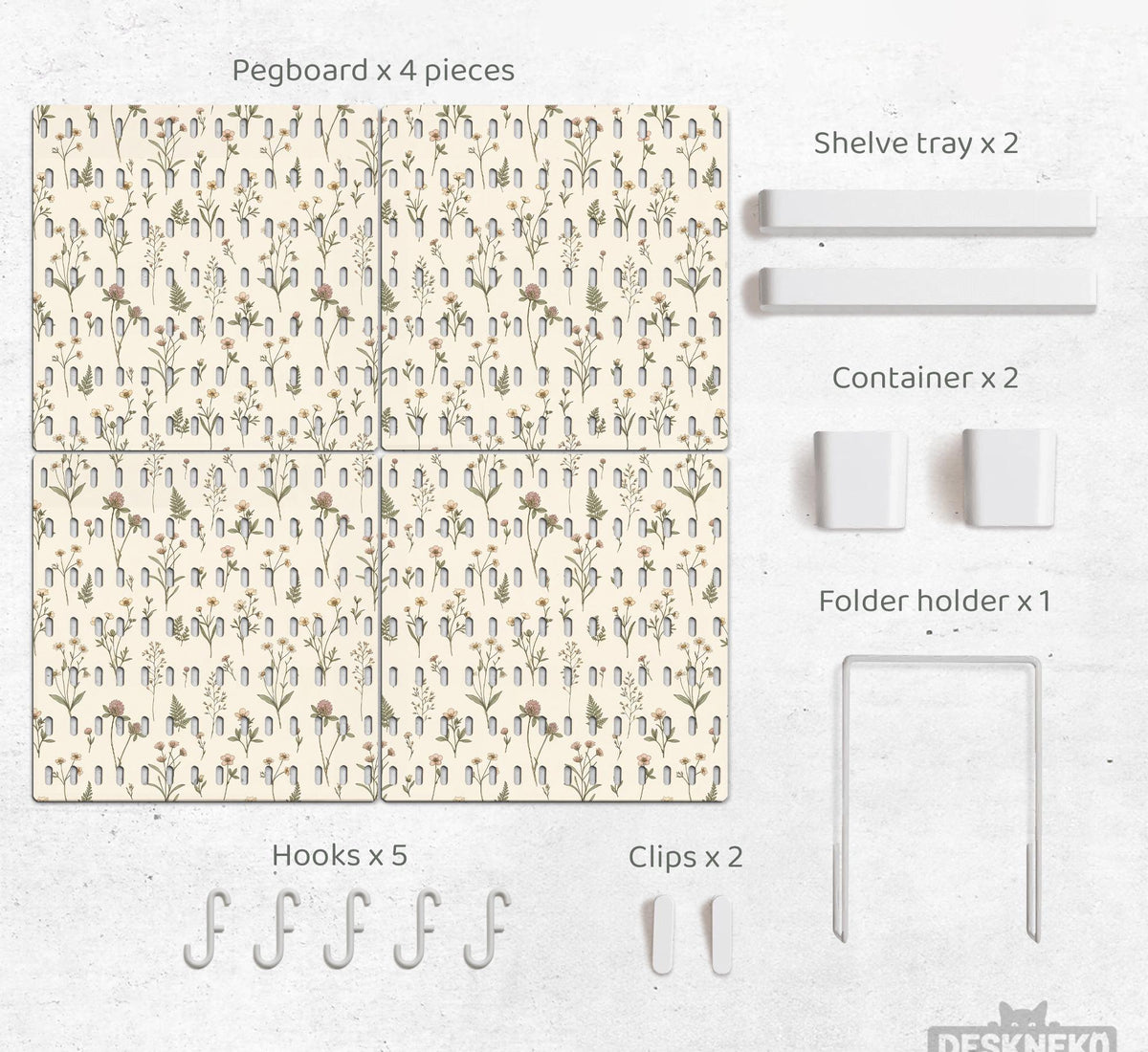 Cream pegboard wall organizer with small floral print, sage green stems, black slot layout, shelves, hooks, clips, and containers.