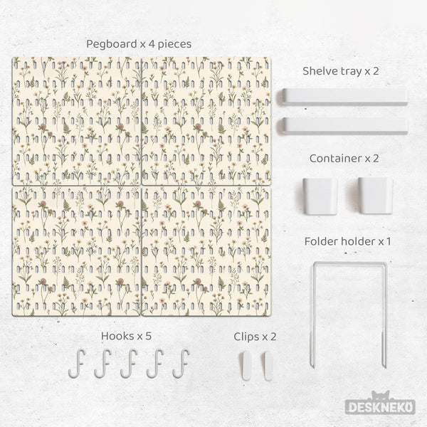 Cream pegboard wall organizer with small floral print, sage green stems, black slot layout, shelves, hooks, clips, and containers.