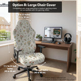 Cream chair cover with a scattered cottage garden floral print in red, blue, yellow, and green on a light background.