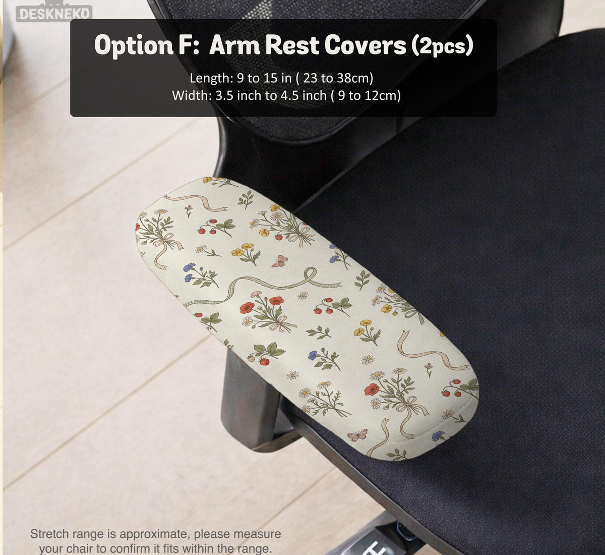 Cream chair cover with a scattered cottage garden floral print in red, blue, yellow, and green on a light background.