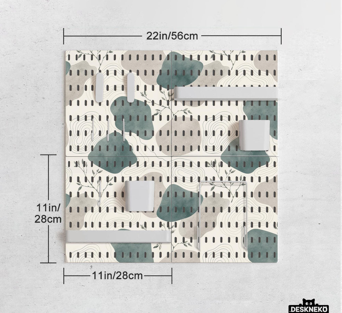 Four pegboard panels in sage green with cream, grey, teal, and leafy botanical artwork arranged in a square layout.