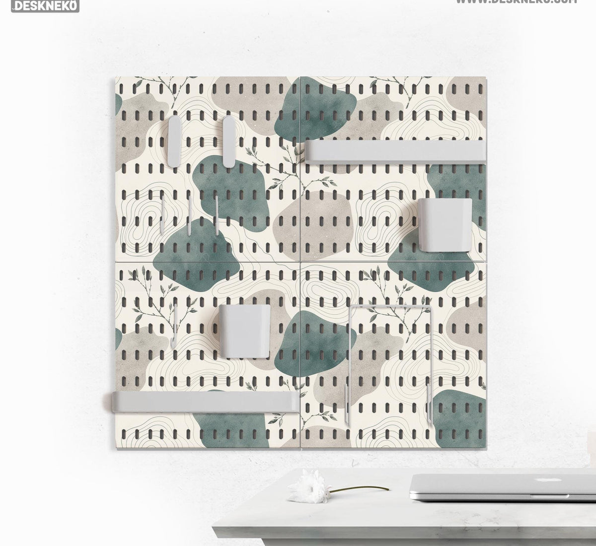Four pegboard panels in sage green with cream, grey, teal, and leafy botanical artwork arranged in a square layout.