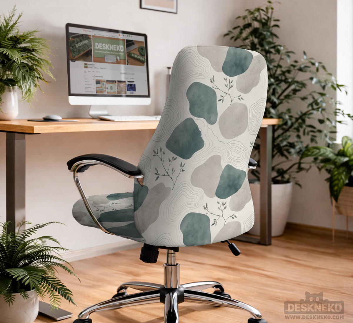 Chair cover with a cream background, muted sage abstract shapes, grey organic forms, and small botanical accents.