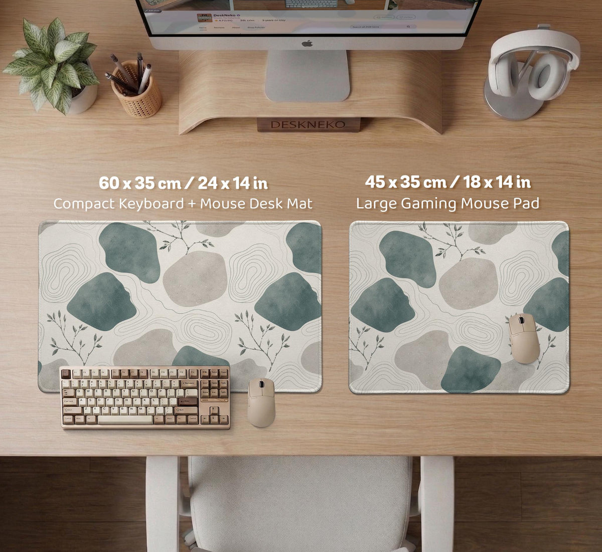 A desk mat with sage green abstract blocks, cream space, gray stone-like shapes, fine topographic contour lines, and small branch details.