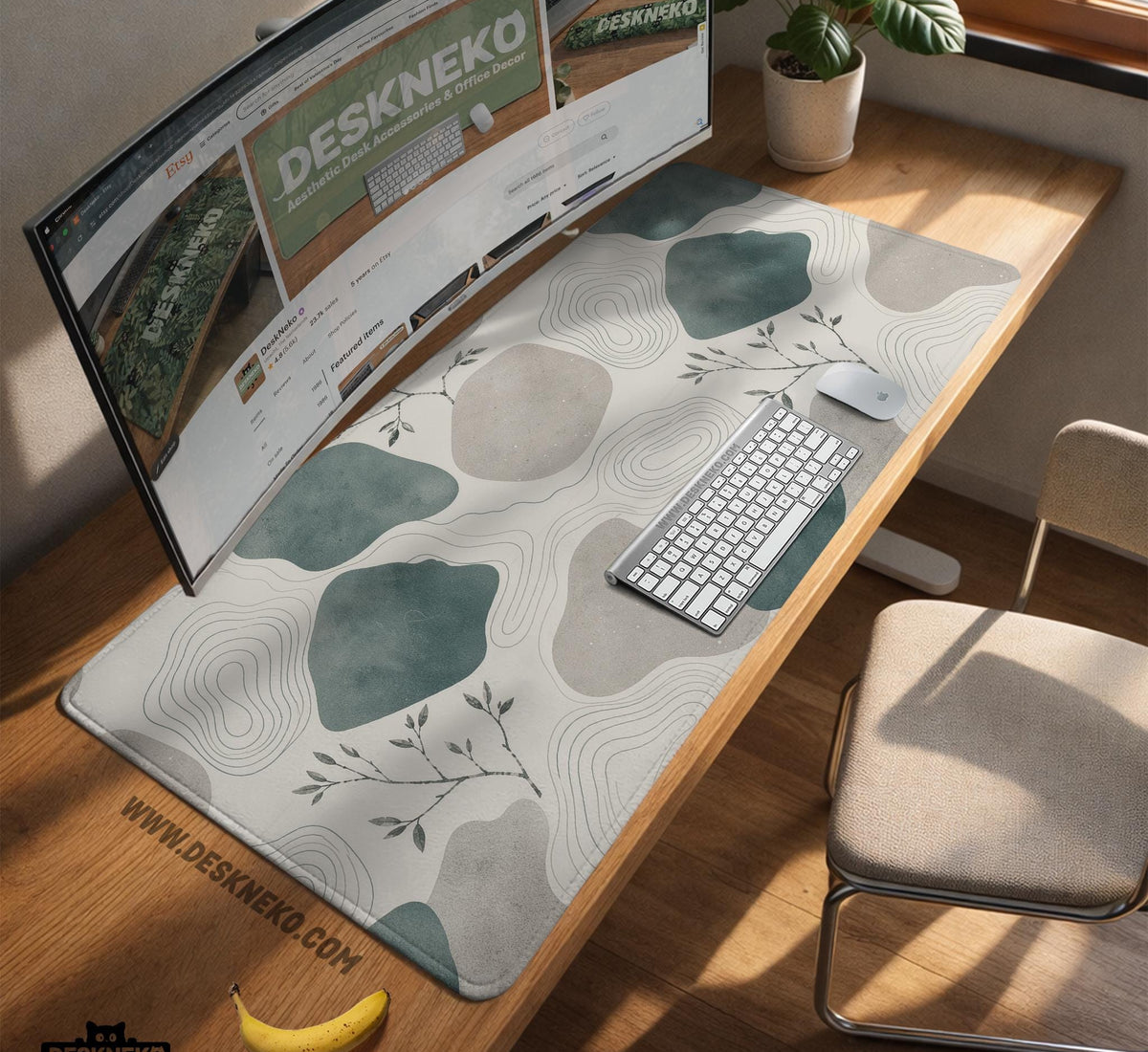 A desk mat with sage green abstract blocks, cream space, gray stone-like shapes, fine topographic contour lines, and small branch details.
