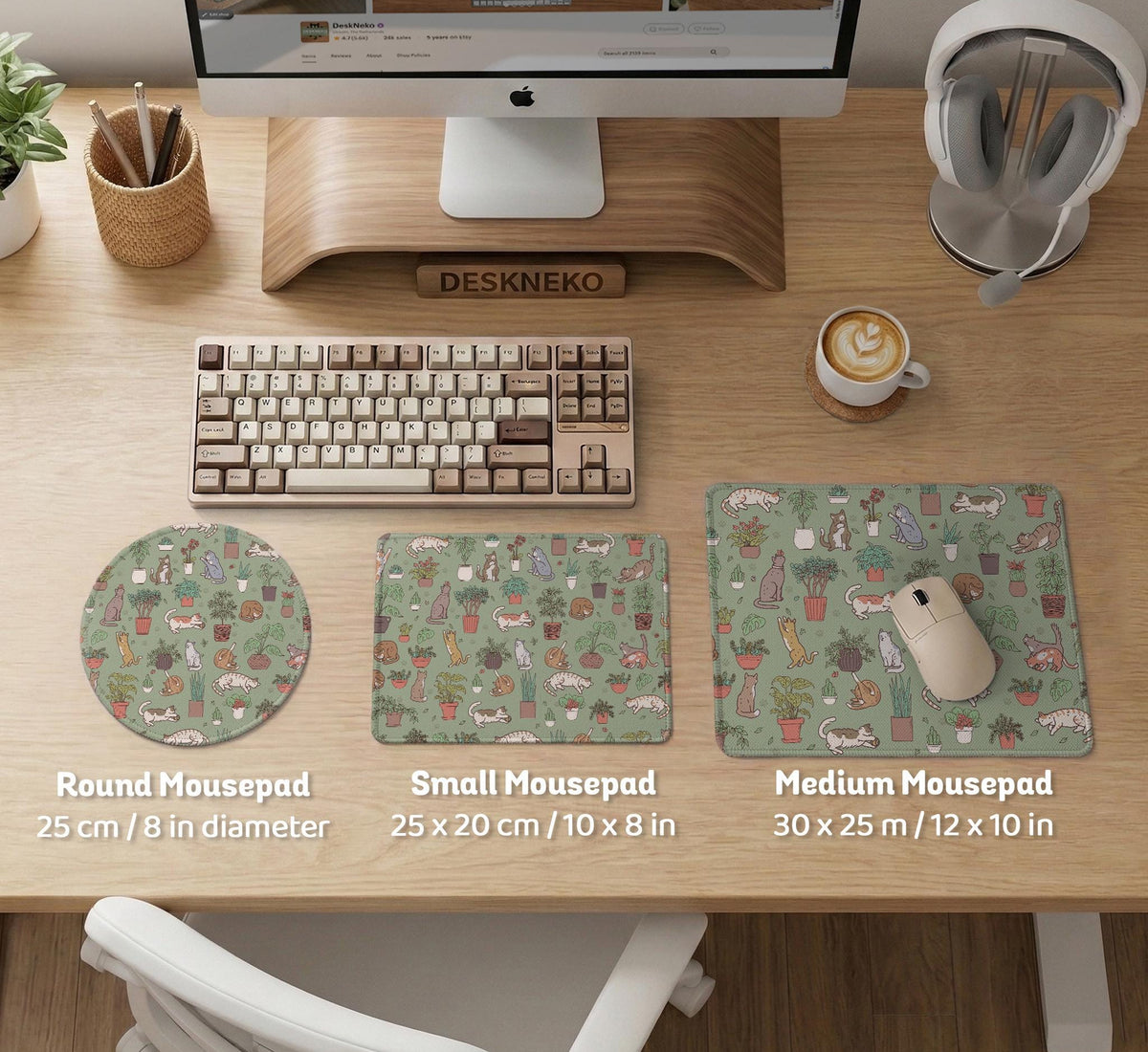 A desk mat with a repeating pattern of cats, leafy houseplants, cactus pots, and small plant-shop style details in sage green.