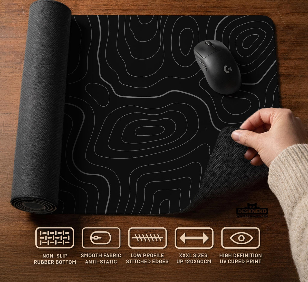 Black desk mat with a thin gray topographic contour line pattern.
