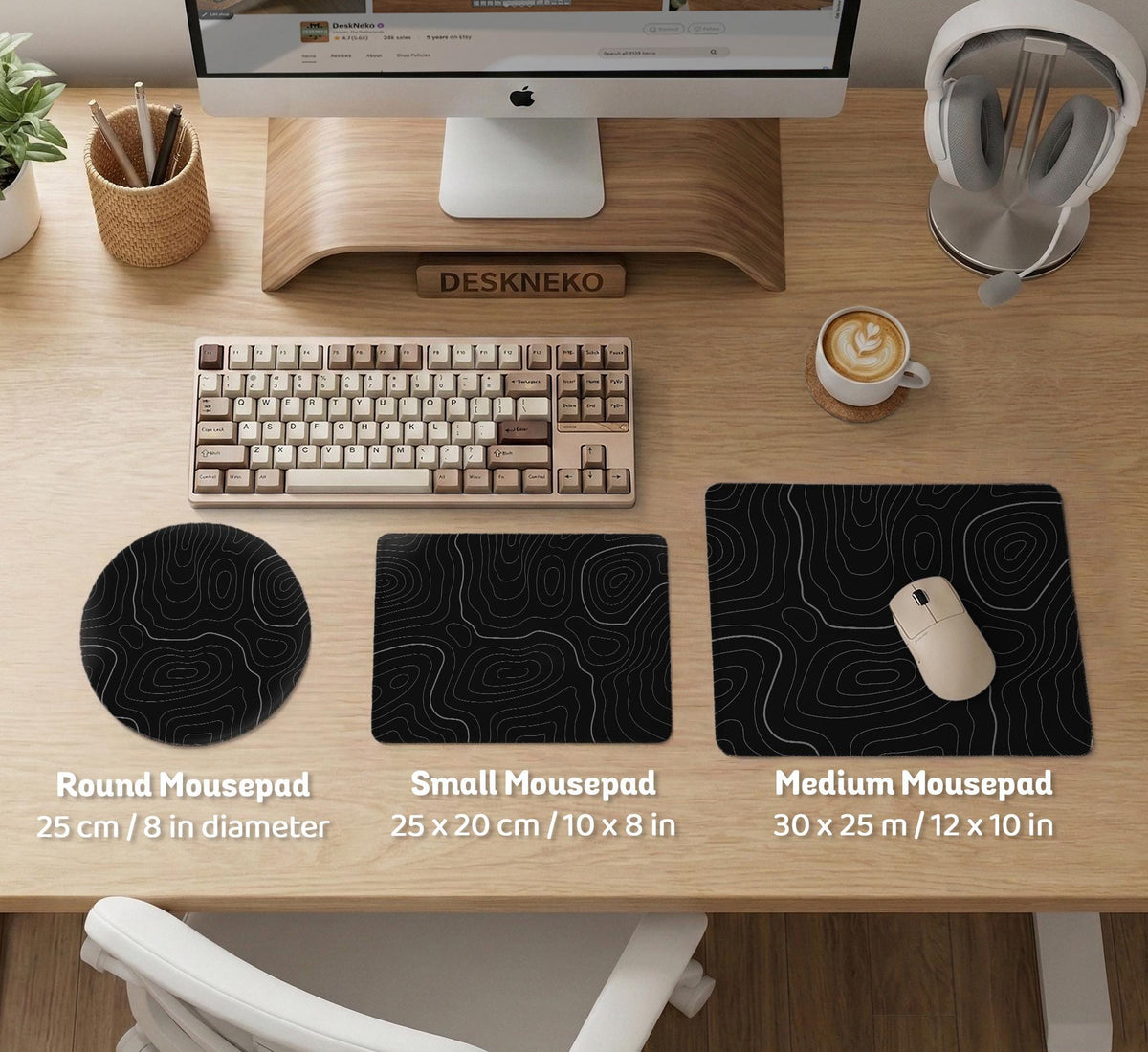 Black desk mat with a thin gray topographic contour line pattern.