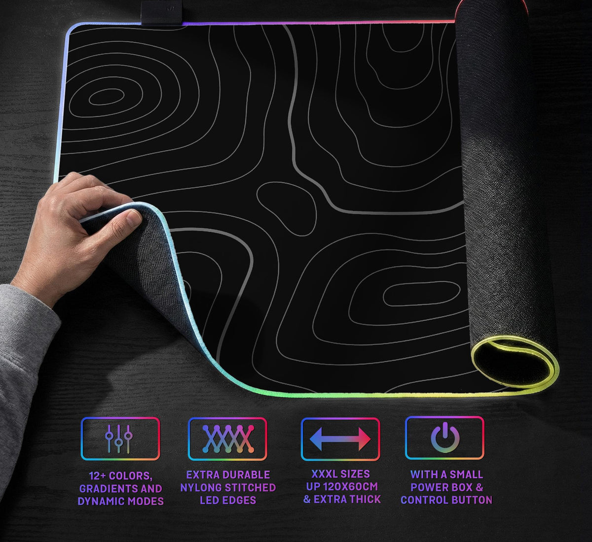 Black desk mat with a thin gray topographic contour line pattern.