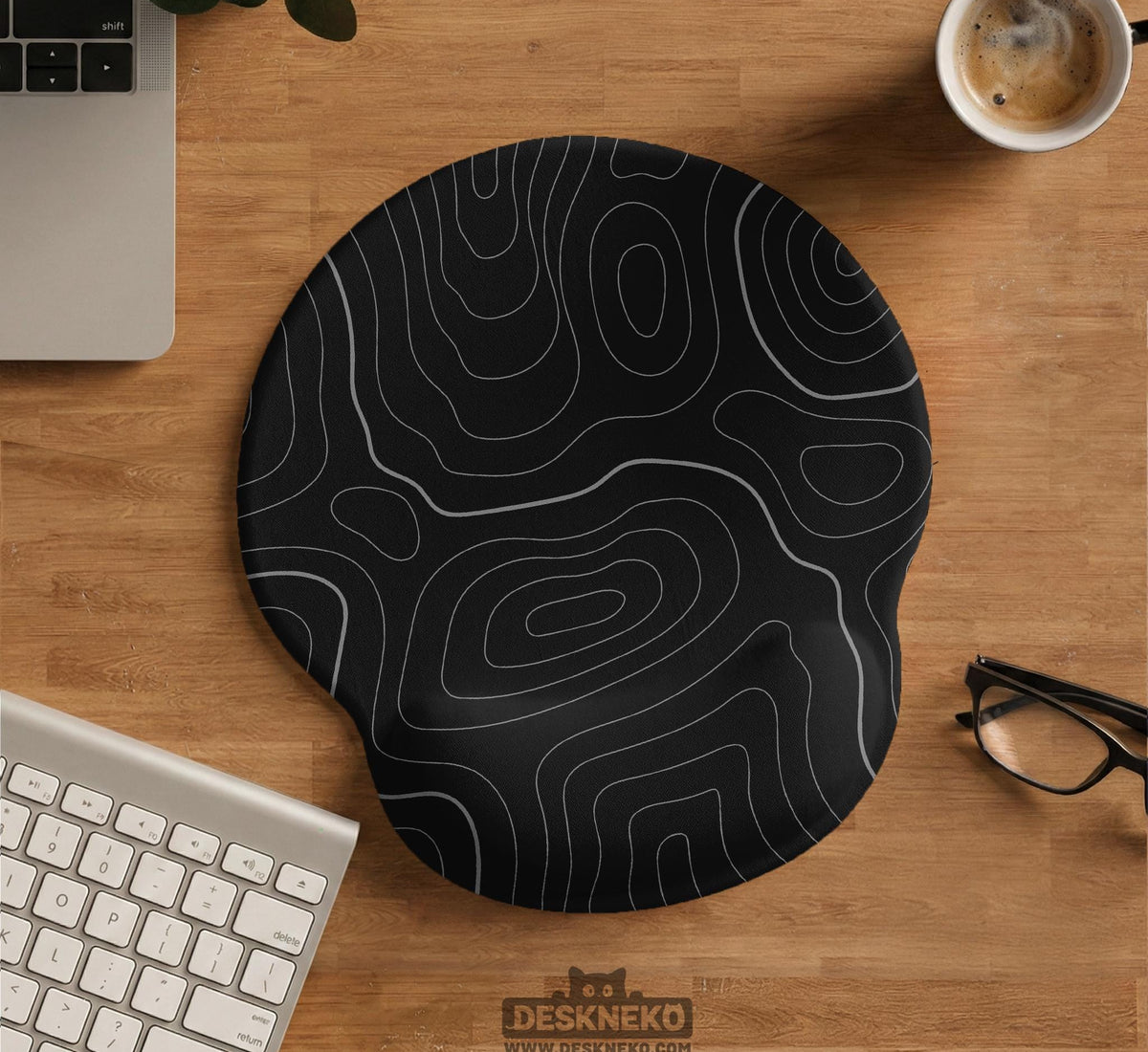 Black mousepad with a gray topographic contour line pattern shown with matching keyboard wrist rest options.