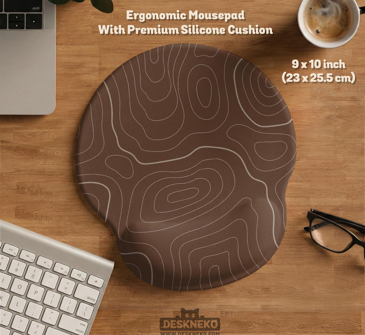 Brown desk mat with a repeating topographic contour line pattern in a neutral earth tone design.
