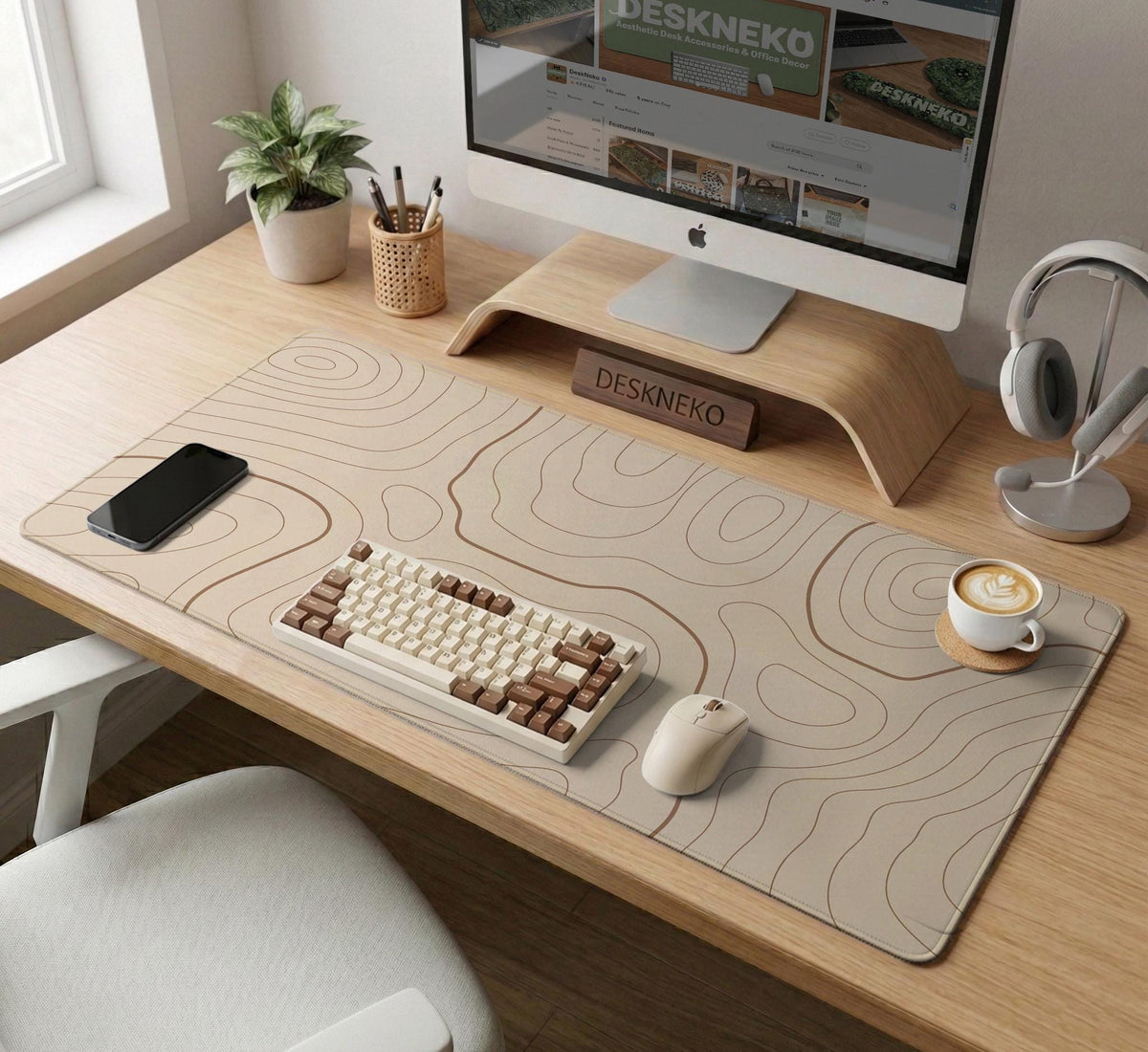 A beige mousepad with a topographic line pattern in a repeating design.