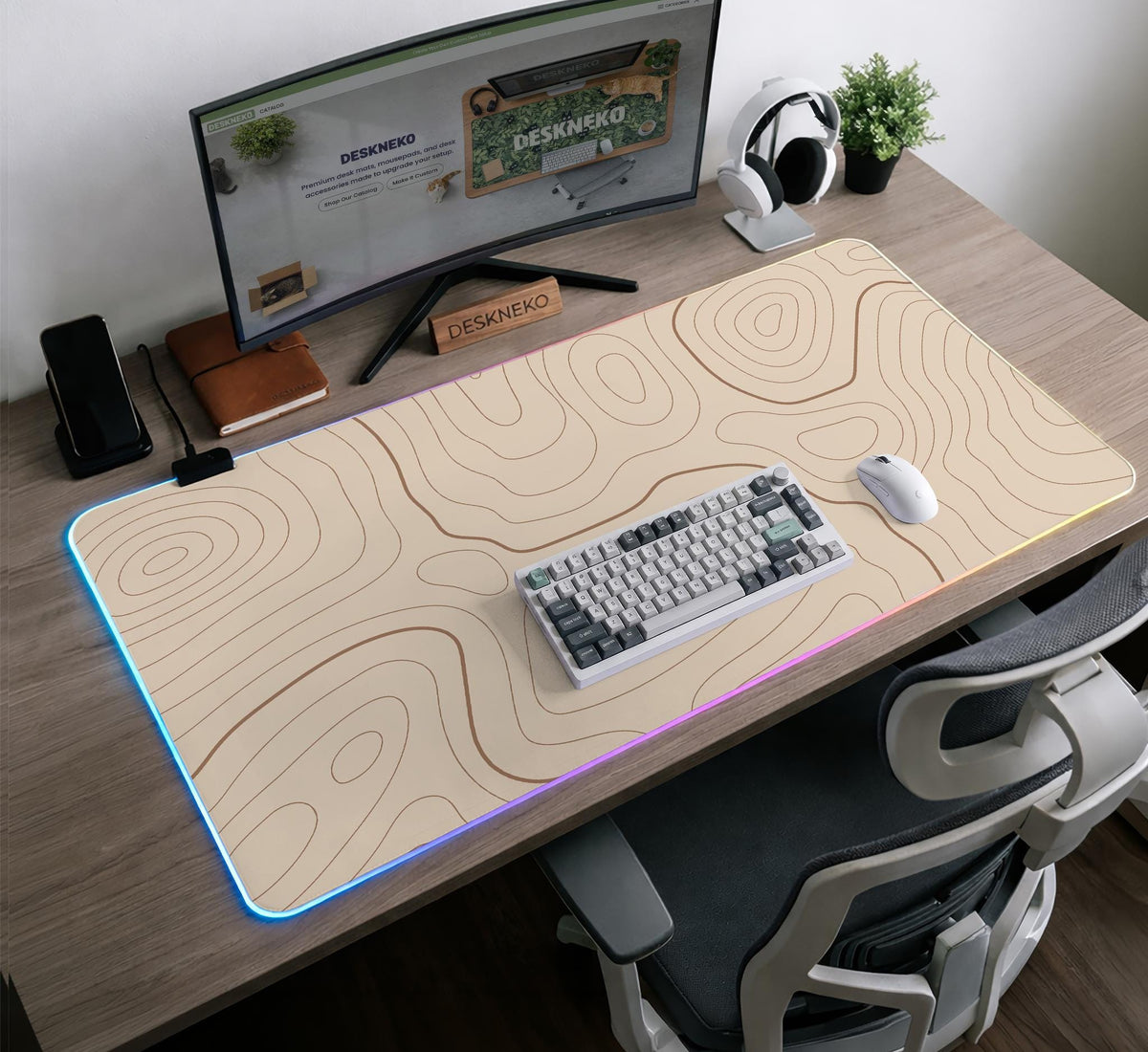 A beige mousepad with a topographic line pattern in a repeating design.