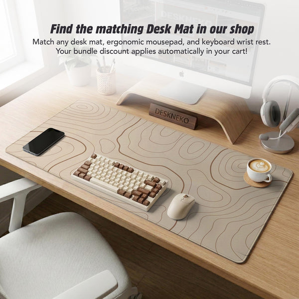 Beige mousepad and keyboard wrist rest with a topographic line pattern shown in a neutral desk setup.