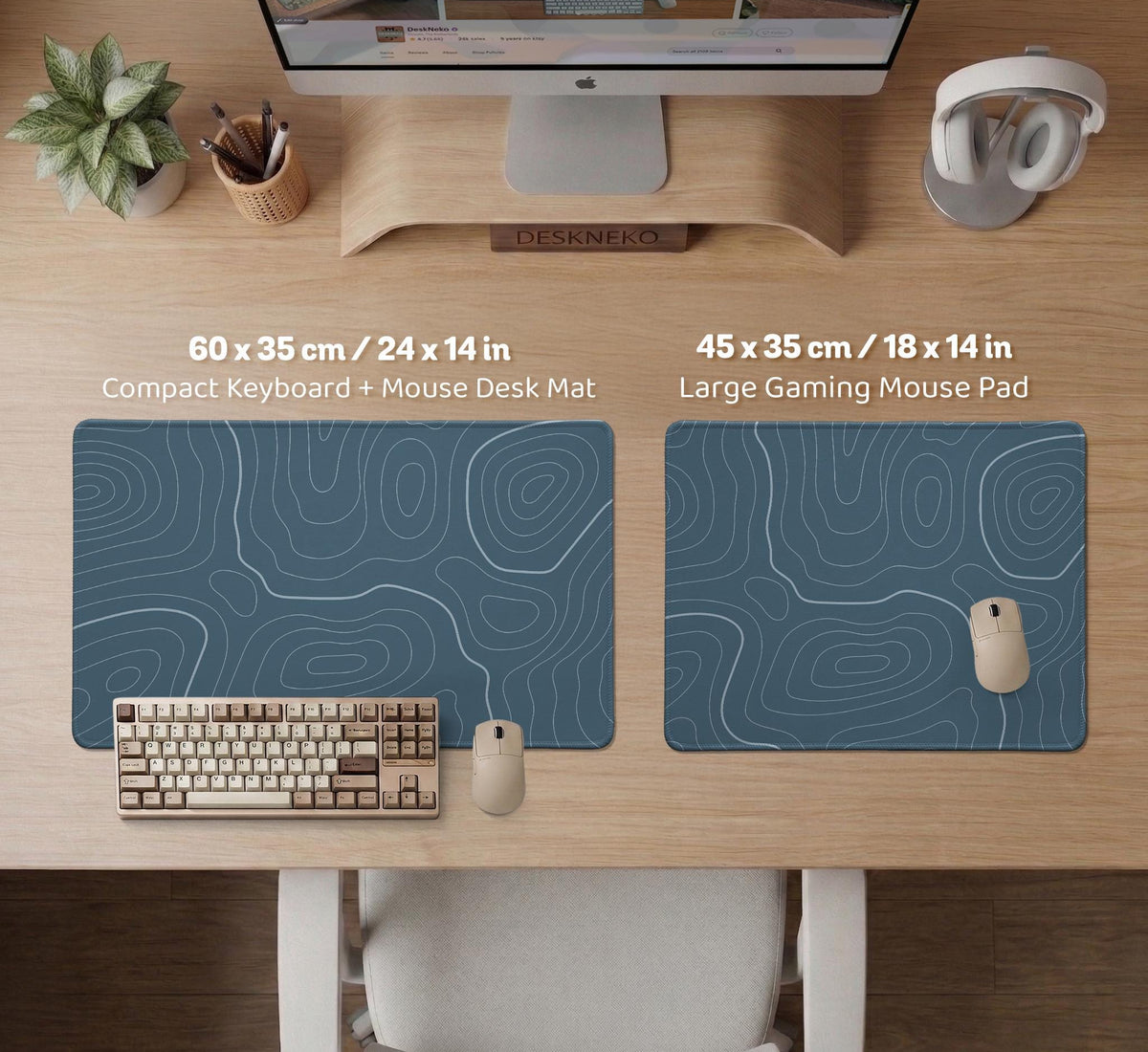 Blue mousepad with a topographic line pattern on a slate background.