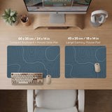 Blue mousepad with a topographic line pattern on a slate background.
