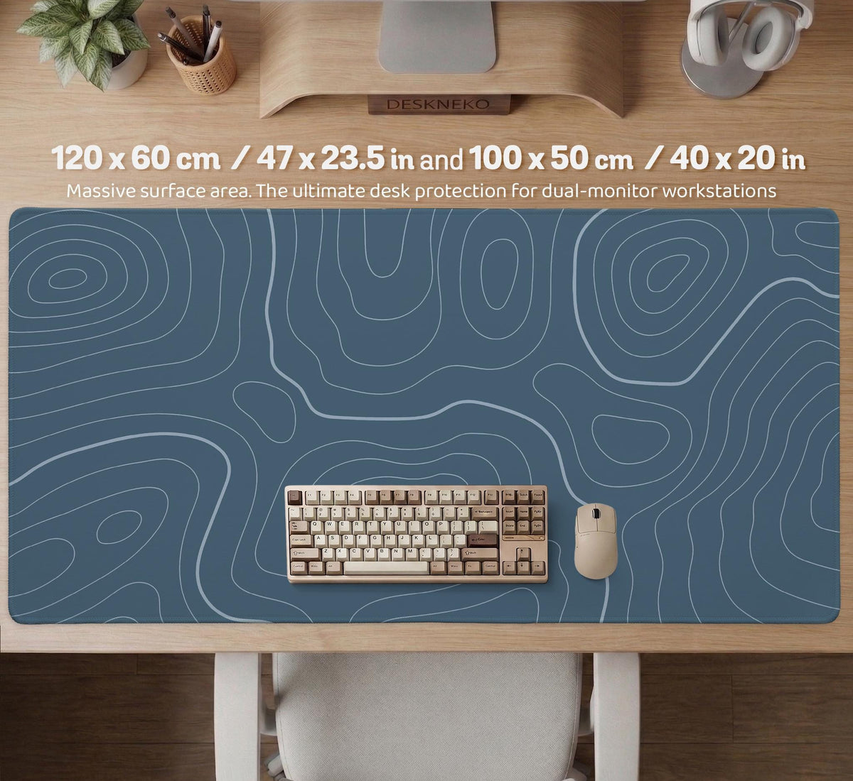 Blue mousepad with a topographic line pattern on a slate background.
