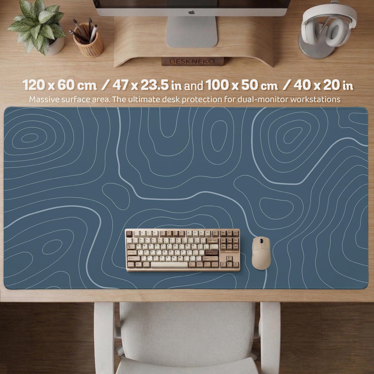 Blue mousepad with a topographic line pattern on a slate background.