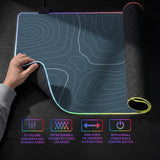 Blue mousepad with a topographic line pattern on a slate background.