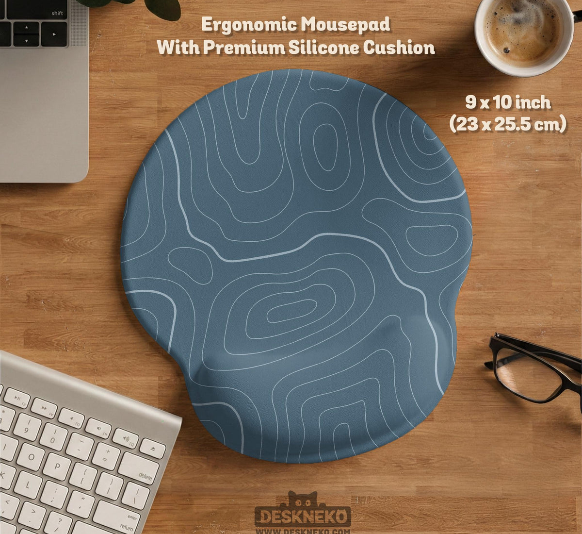 A slate blue desk mat with thin contour line map art on a light background.