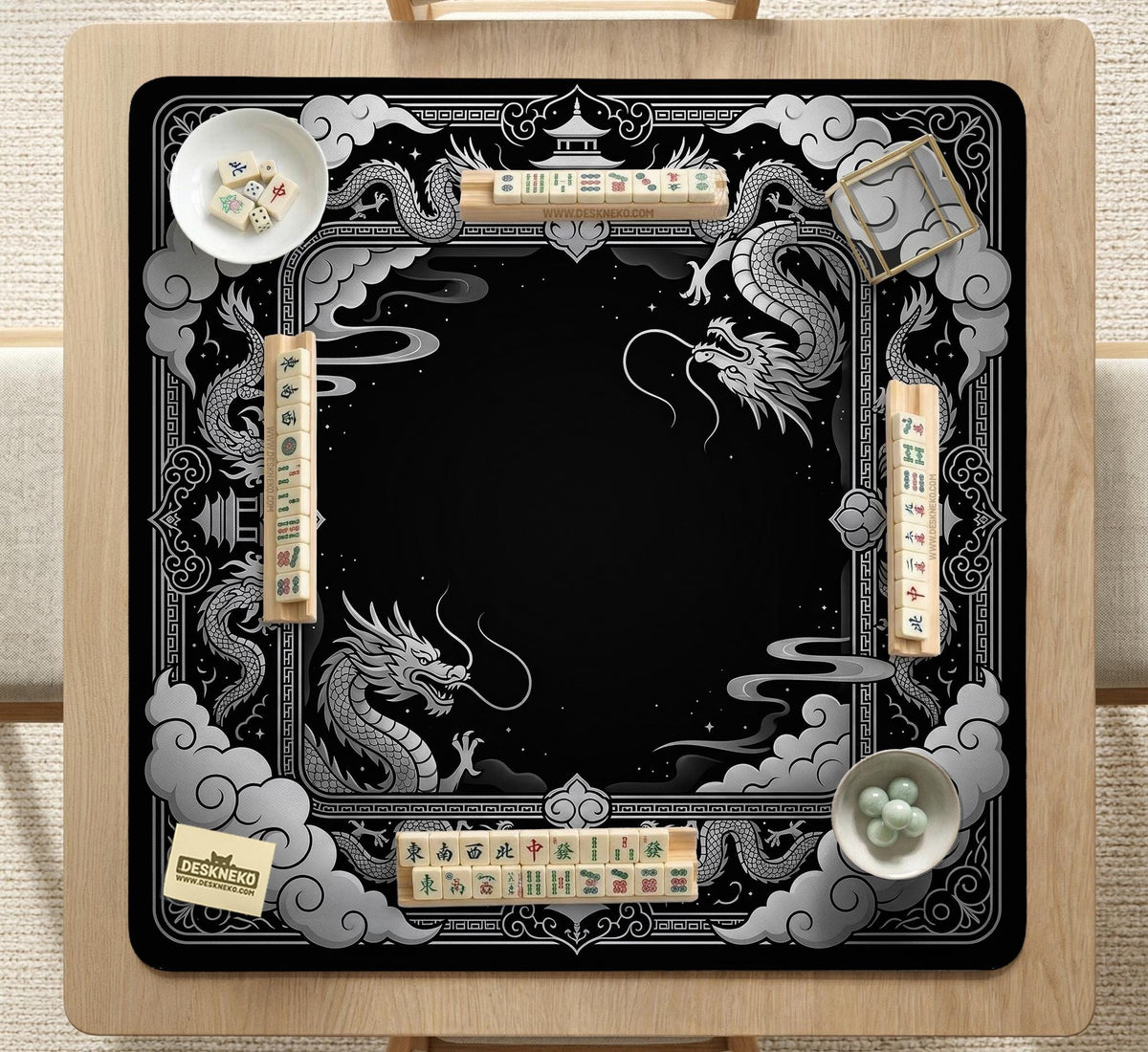 Square mahjong table mat with a black and silver dragon border, cloud details, and a scalloped edge.