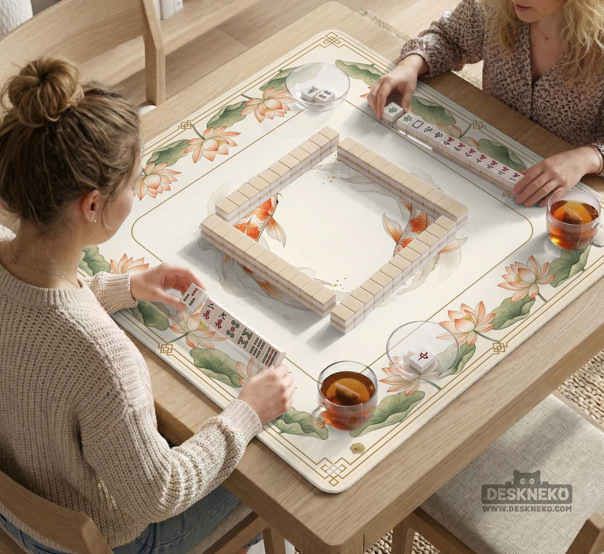 Ivory square mahjong mat with watercolor koi fish, lotus flowers, peach blossoms, sage leaves, and a thin gold border.