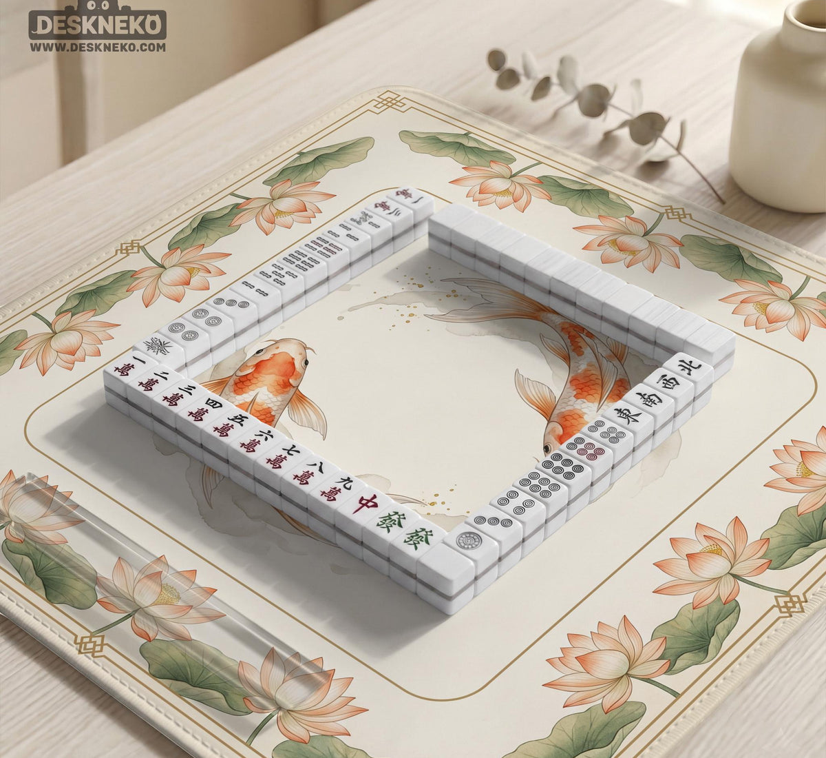Ivory square mahjong mat with watercolor koi fish, lotus flowers, peach blossoms, sage leaves, and a thin gold border.