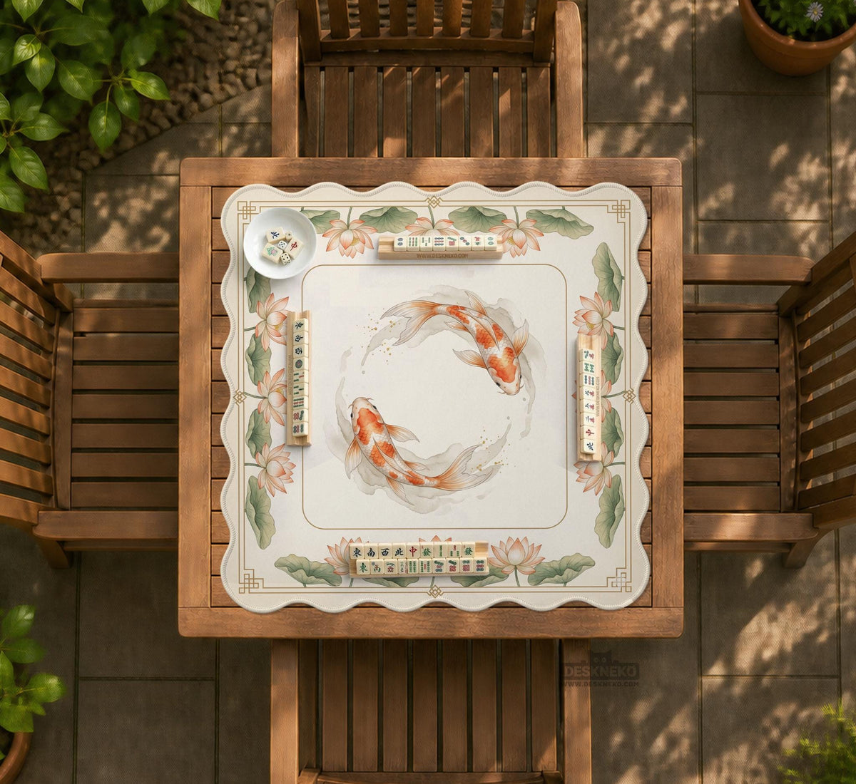 Ivory square mahjong mat with watercolor koi fish, lotus flowers, peach blossoms, sage leaves, and a thin gold border.