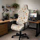 Desk chair cover options with a cute forest print featuring foxes, bunnies, mushrooms, leaves, acorns, and soft neutral colors.