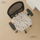 Desk chair cover options with a cute forest print featuring foxes, bunnies, mushrooms, leaves, acorns, and soft neutral colors.