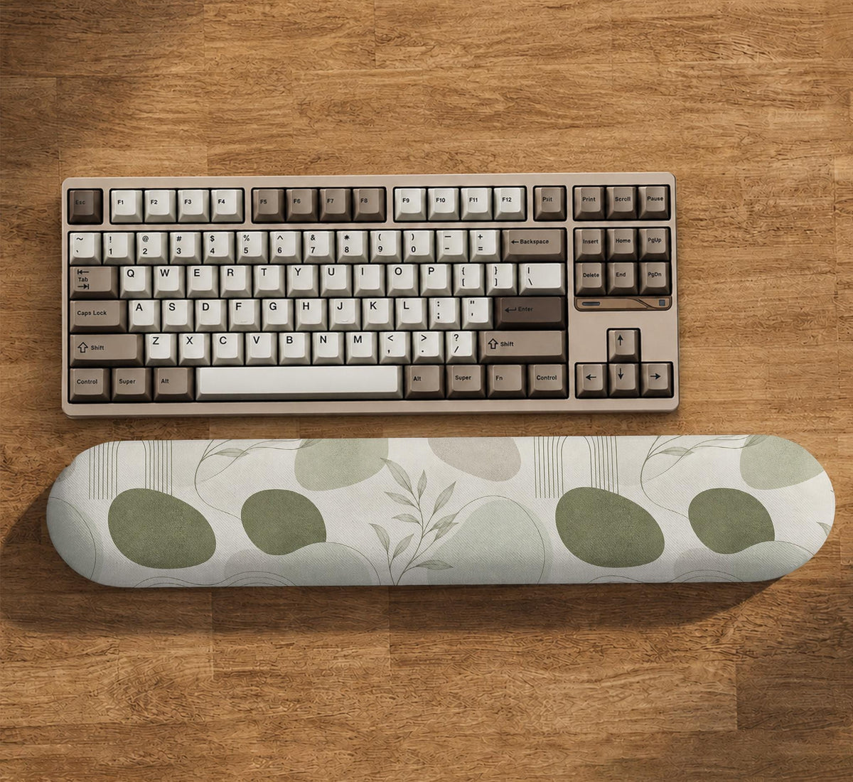 Green abstract botanical mouse pad with a rounded organic pattern and matching keyboard wrist rest option.