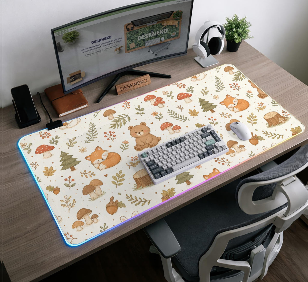Cream desk mat with a woodland animal pattern featuring foxes, bunnies, mushrooms, berries, acorns, and sage leaves in soft green tones.