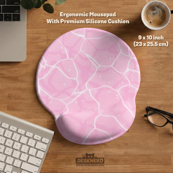 Soft pink mouse pad and wrist rest with a cloud-marble pattern, pale linework, and small star details.