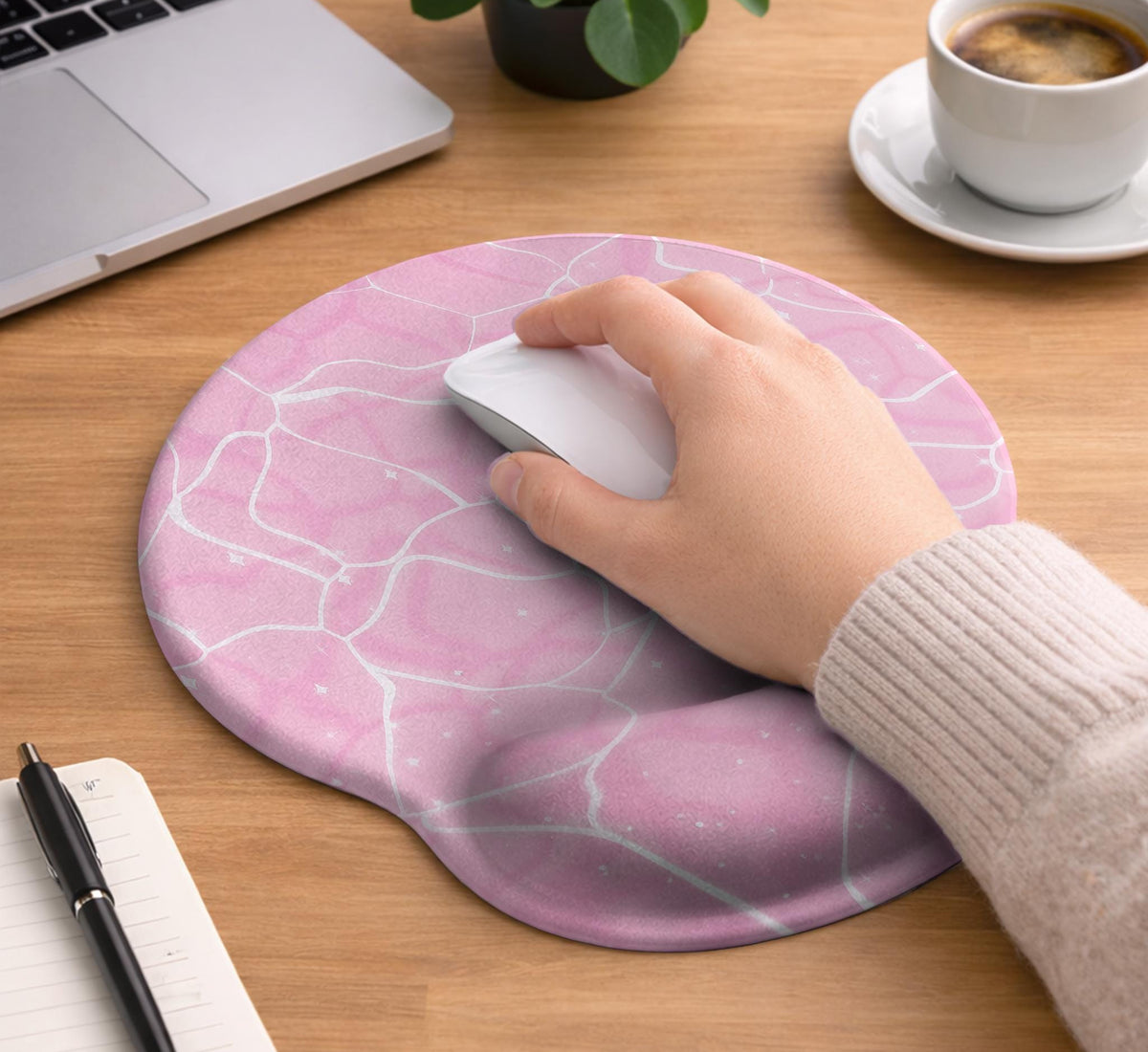 Soft pink mouse pad and wrist rest with a cloud-marble pattern, pale linework, and small star details.