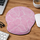Soft pink mouse pad and wrist rest with a cloud-marble pattern, pale linework, and small star details.