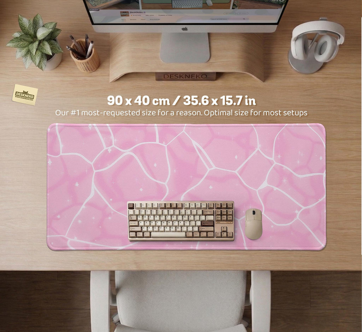 Soft pink desk mat with a kawaii cloud-marble pattern, white crackle lines, and small star accents.
