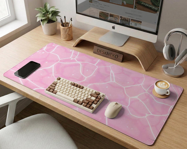 Soft pink desk mat with a kawaii cloud-marble pattern, white crackle lines, and small star accents.