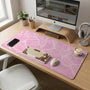 Soft pink desk mat with a kawaii cloud-marble pattern, white crackle lines, and small star accents.