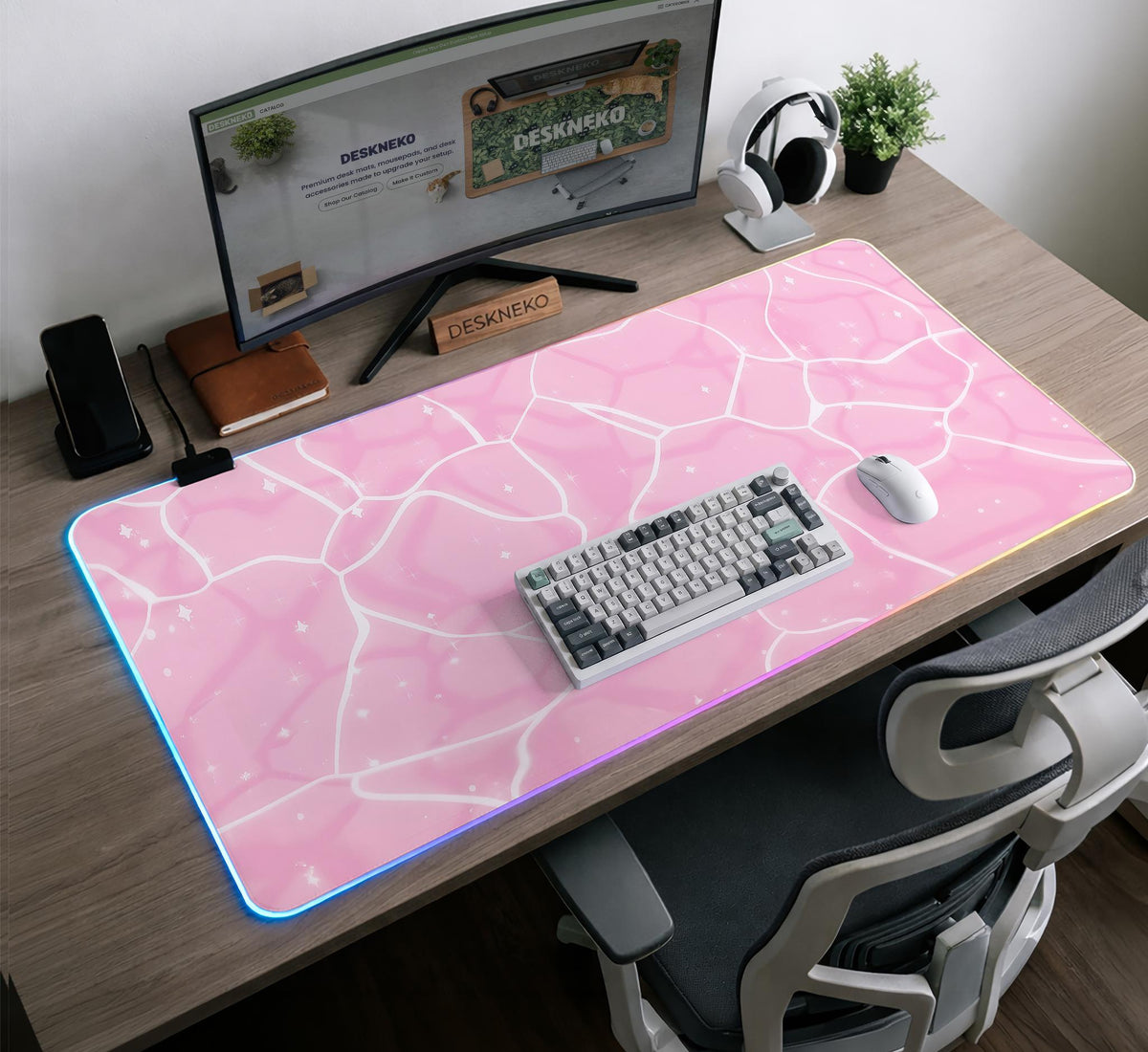 Soft pink desk mat with a kawaii cloud-marble pattern, white crackle lines, and small star accents.