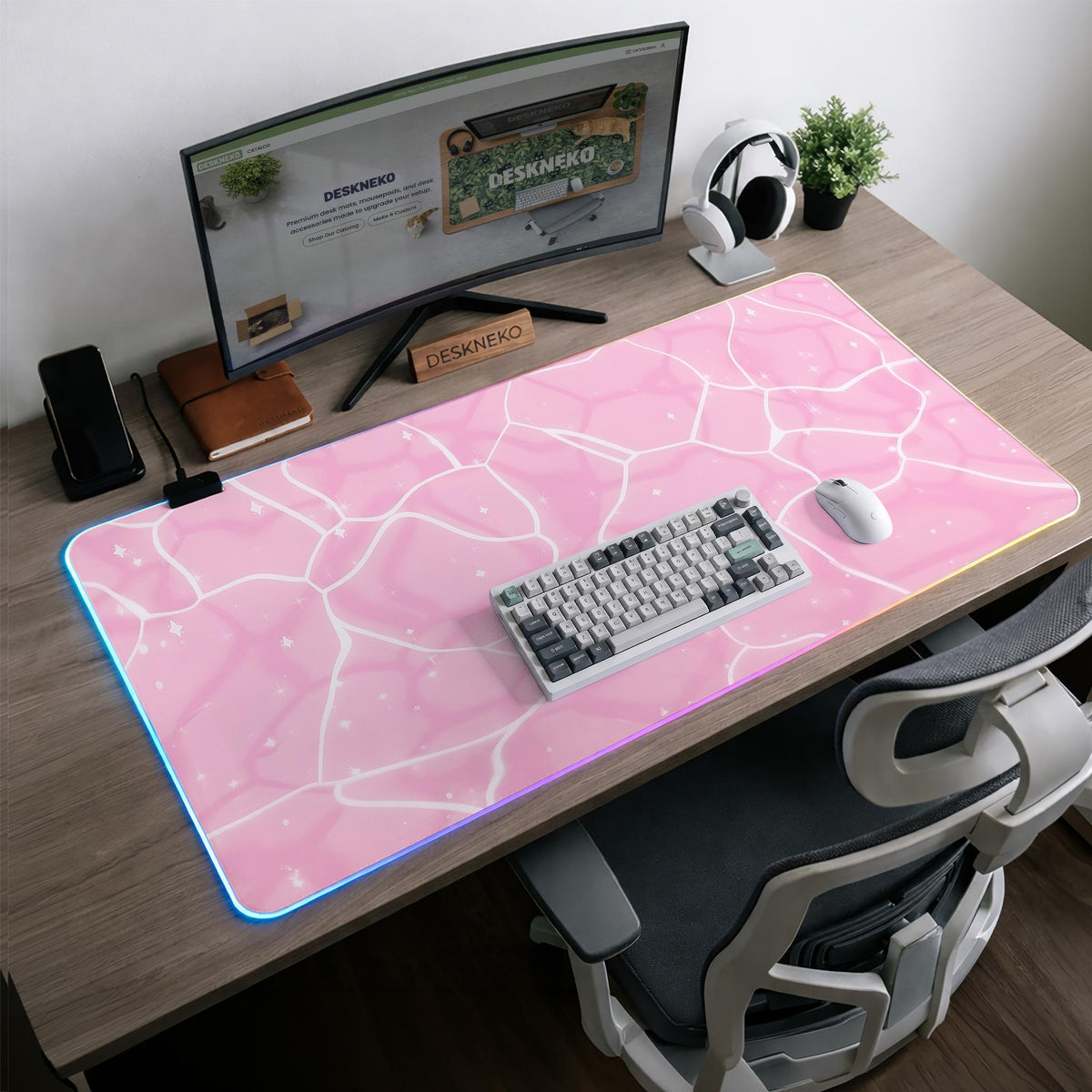 Soft pink desk mat with a kawaii cloud-marble pattern, white crackle lines, and small star accents.