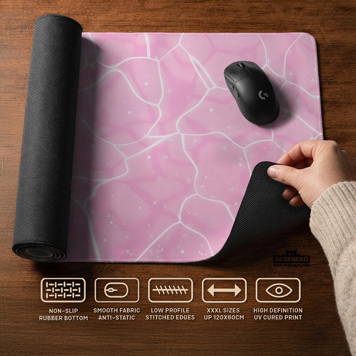 Soft pink desk mat with a kawaii cloud-marble pattern, white crackle lines, and small star accents.